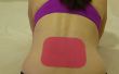 Reduzieren Sie Schmerzen im Rücken mit Kinesiologie Tape