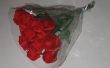 Ein Dutzend rote Origami Rosen