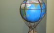 Steampunk-Heißluftballon aus einem Globus