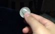 Palming eine Münze