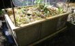 Macht ein Gartenbett angehoben aus Betonstein