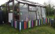 Gewächshaus Kind Zaun aus recycelten Paletten