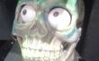 Animierte Halloween Totenkopf mit leuchtenden Augen