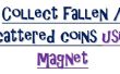 Ein kreativer Einsatz von Magneten. Sammeln Sie gefallene oder verstreute Münzen mit Magneten. ein Experiment mit Magnet. 
