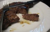 Kochen das perfekte Steak auf Holzkohlen-Grill