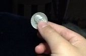 Palming eine Münze