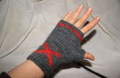 X markiert die Stelle: fingerlose Handschuhe