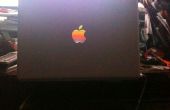 Einbettung eines alten Apple-Logos in ein Macbook